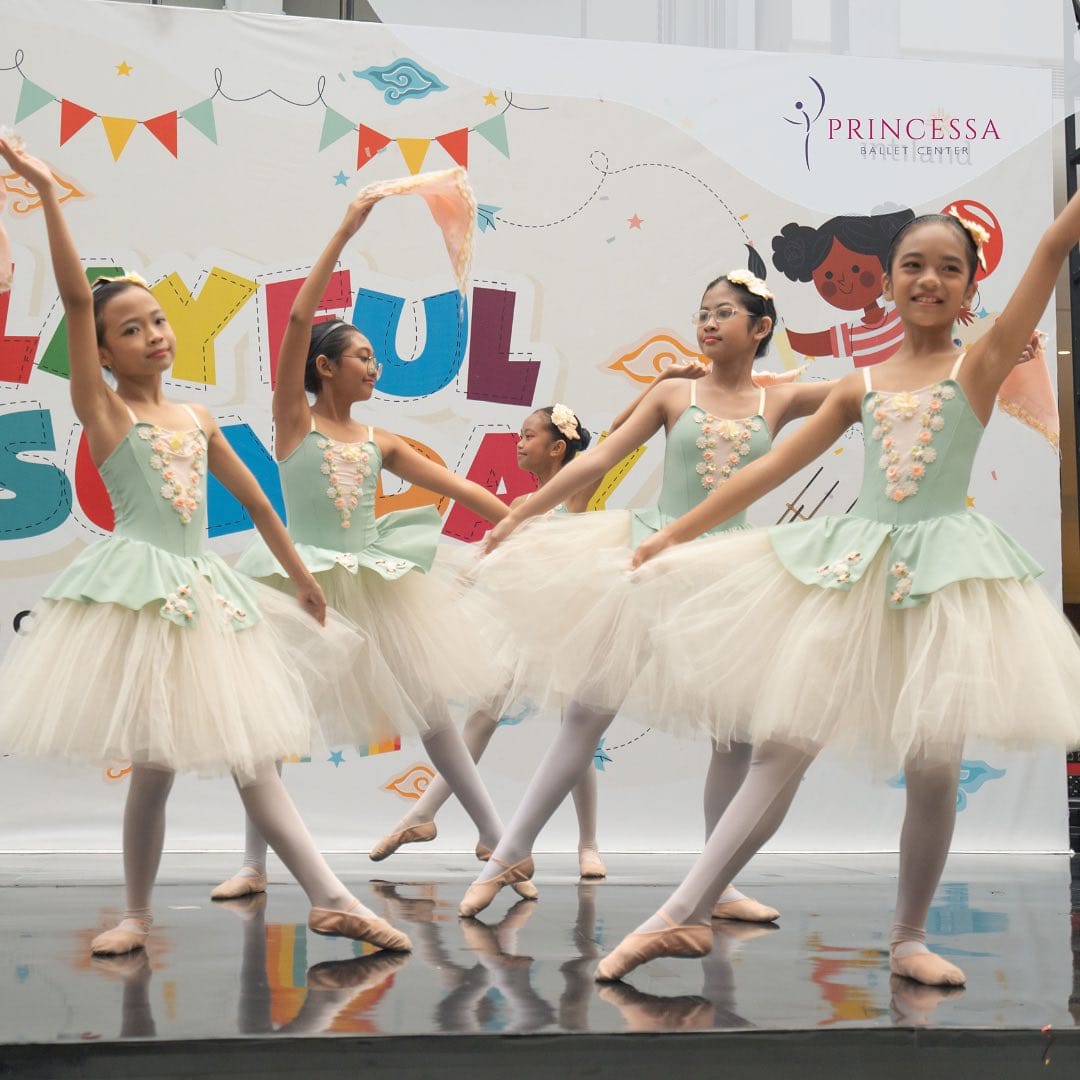 Dancers in mint green tutus on stage at SQ Dome